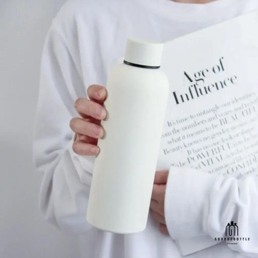 Gourde Isotherme  blanc en Acier Inoxydable à Double Paroi  Votre Compagnon Polyvalent pour l'Hydratation